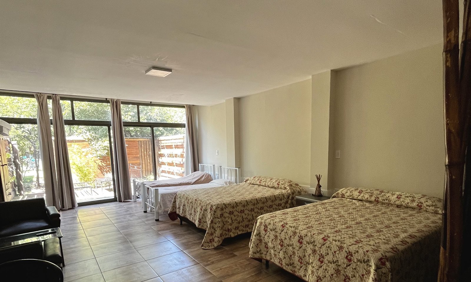 Habitación Premium con estar y ventanal al jardín